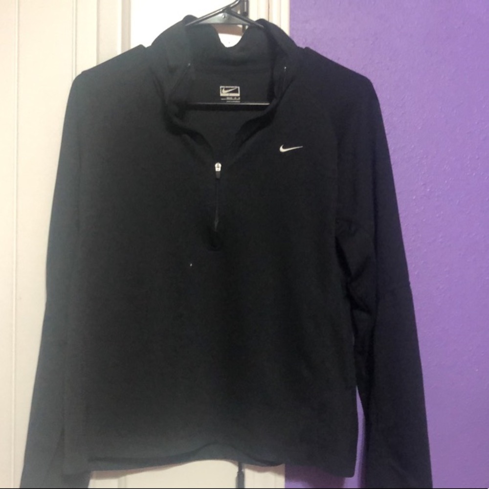 Black nike zip up.